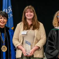 provost and president with student